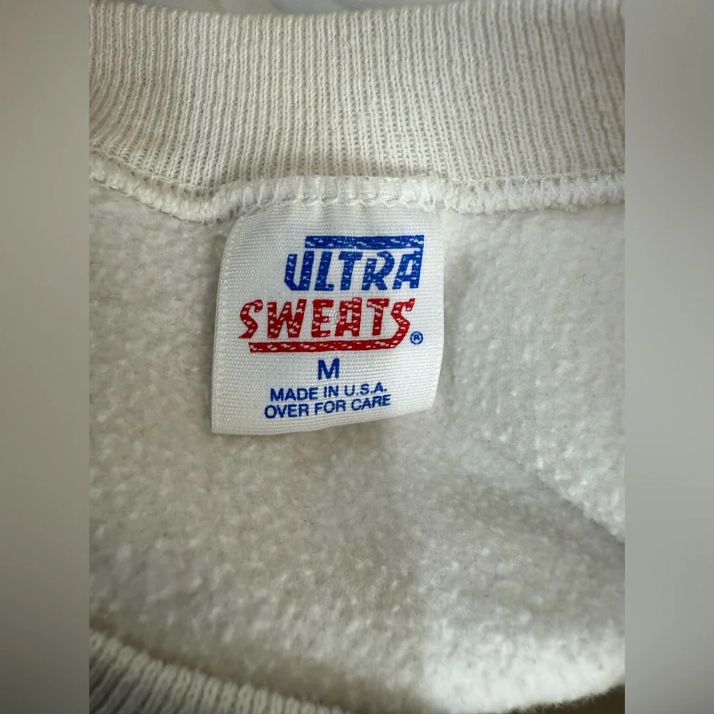 ULTRA SWEATS. Vintage White Crewneck Sweatshirt with Bat Graphic and Yellow